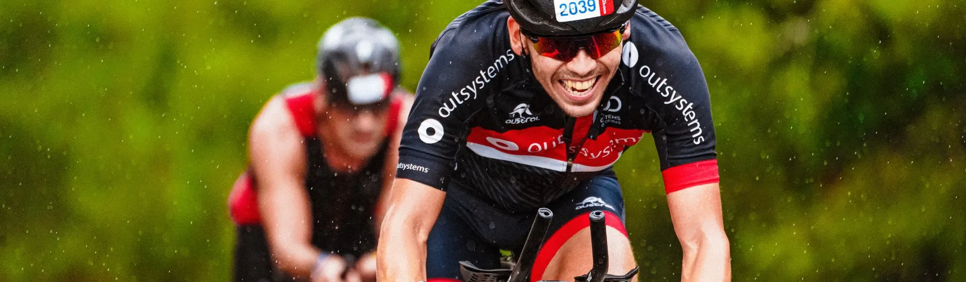two competitive bikers, racing to the finish line