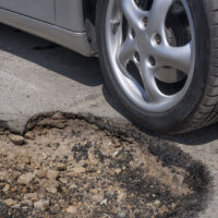 How Can a Pothole Cause a Serious Car Accident?